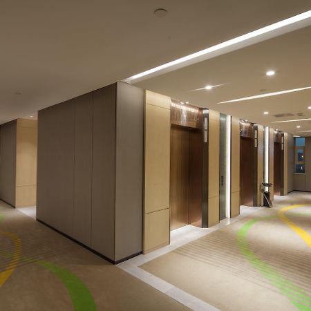 Hai Tian Expo Hotel Qingdao Bagian luar foto
