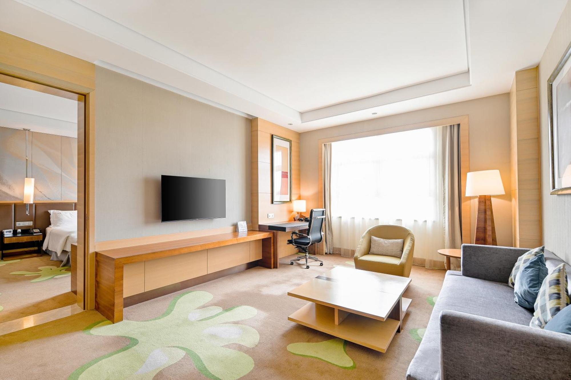 Hai Tian Expo Hotel Qingdao Bagian luar foto